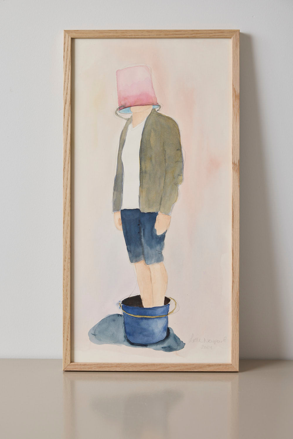 Bucketman med lyserød spand