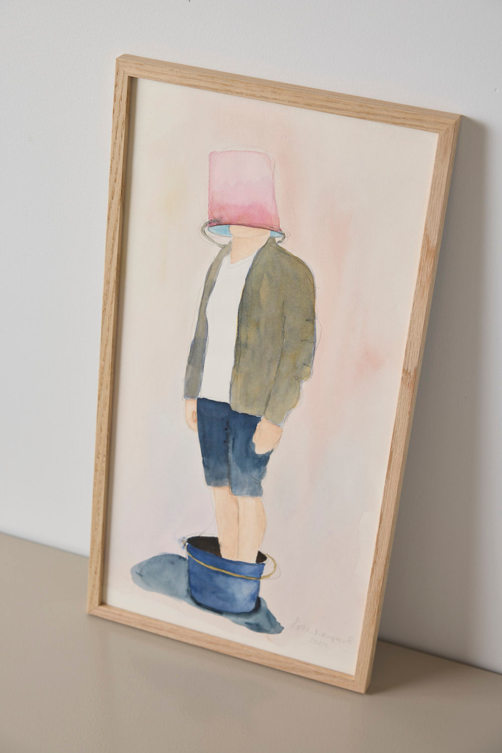 Bucketman med lyserød spand